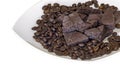 Chocolate and coffee beans on a white plate isolated background Royalty Free Stock Photo