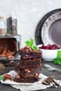 Chocolate brownie with berries and nuts