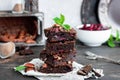 Chocolate brownie with berries and nuts