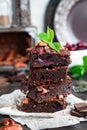 Chocolate brownie with berries and nuts