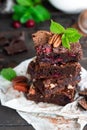 Chocolate brownie with berries and nuts