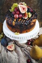 Chocolate coffee cake decorated fresh fruits Royalty Free Stock Photo