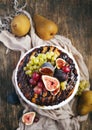 Chocolate coffee cake decorated with fresh fruits Royalty Free Stock Photo