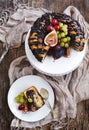 Chocolate coffee cake decorated with fresh fruits Royalty Free Stock Photo