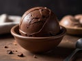 Chocolate coffee ice cream ball in a bowl. ice cream scoop. Royalty Free Stock Photo