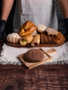 Chocolate concha bread on a rustic wooden table Royalty Free Stock Photo