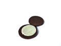 Chocolate cookie filled with cream on white background. desserts concept