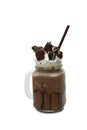 Chocolate cookie milkshake in tall mugs with chocolate whipped c Royalty Free Stock Photo