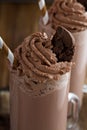 Chocolate cookie milkshake in tall mugs Royalty Free Stock Photo