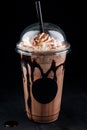 Chocolate cookie milkshake in tall mugs with chocolate whipped cream Royalty Free Stock Photo