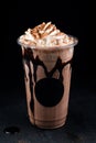 Chocolate cookie milkshake in tall mugs with chocolate whipped cream Royalty Free Stock Photo