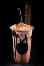 Chocolate cookie milkshake in tall mugs with chocolate whipped cream Royalty Free Stock Photo