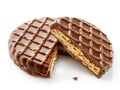 A chocolate cookie with a wavy pattern is cut in half Royalty Free Stock Photo