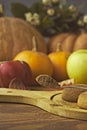 Cookies with pumpkins and apples on the table. Royalty Free Stock Photo