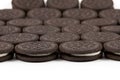 Chocolate cookies with cream filling on white background Royalty Free Stock Photo