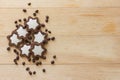 Chocolate cookies in the form of stars on a wooden background Royalty Free Stock Photo