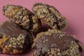 Chocolate cookies with nuts on a pink background Royalty Free Stock Photo