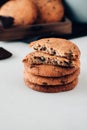 Chocolate cookies on white table. Chocolate chip cookies shot.