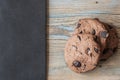 Chocolate cookies on wooden table. Royalty Free Stock Photo