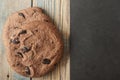 Chocolate cookies on wooden table. Royalty Free Stock Photo