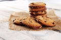 Chocolate cookies on wooden table. Chocolate chip cookies shot on wooden white table Royalty Free Stock Photo