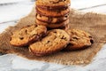 Chocolate cookies on wooden table. Chocolate chip cookies shot on wooden white table Royalty Free Stock Photo