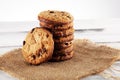 Chocolate cookies on wooden table. Chocolate chip cookies shot on wooden white table Royalty Free Stock Photo