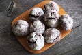 Chocolate cookies on wooden table with coffee bean, cocoa powder