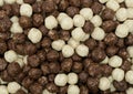 Chocolate corn flakes teture background. Chocolate puff cereal background. Macro shot