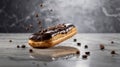 Delicious Coffee Eclair with Dark Chocolate Glaze and Coffee Beans Decoration on Top Royalty Free Stock Photo