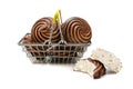 Chocolate-covered marshmallow close-up in a shopping basket, isolated on a white background.Selective focus Royalty Free Stock Photo