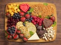 A Chocolate Covered Strawberries and Cheese Sweet Charcuterie Board on a Rustic Wooden Table Royalty Free Stock Photo