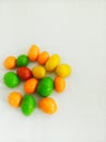 Chocolate covered in sugar with colorful colors that children like. Can be found in many shops around Jakarta, Indonesia