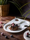 Chocolate cream mousse cake with fresh berries. delicious dessert. Royalty Free Stock Photo