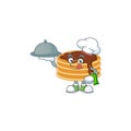 A chocolate cream pancake chef cartoon design with hat and tray