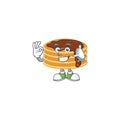 Chocolate cream pancake mascot cartoon design make a call gesture Royalty Free Stock Photo