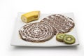 Chocolate crepe, Chocolate pancake with banana and kiwi isolated on white background Royalty Free Stock Photo