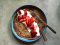 Chocolate crepe on plate with nut butter, cream, fresh strawberries Royalty Free Stock Photo