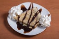 Chocolate crepe with sugar and whipped cream Royalty Free Stock Photo