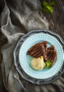 Chocolate crepes with poached pear in syrup Royalty Free Stock Photo