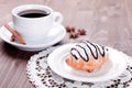 Chocolate croissant on the plate and coffee Royalty Free Stock Photo