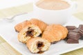 Chocolate Croissants and Cappuccino. Royalty Free Stock Photo