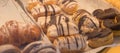Chocolate croissants and other pastries on the counter in the pastry shop. Fresh pastries. Sweet desserts. sale of