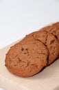 Chocolate crunchy cookies on the wooden board