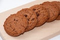 Chocolate crunchy cookies on the wooden board