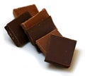 Chocolate cubes  on white background Royalty Free Stock Photo