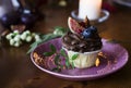 Chocolate cupcake with figs and berries on festive table Royalty Free Stock Photo