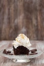 Chocolate Cupcake With Vanilla Frosting Missing Bite On Glass Pl Royalty Free Stock Photo