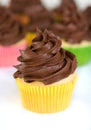 Chocolate cupcake in yellow wrapper Royalty Free Stock Photo