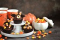 Chocolate cupcakes `bats` - delicious bakery sweets for the celebration of Halloween. Royalty Free Stock Photo